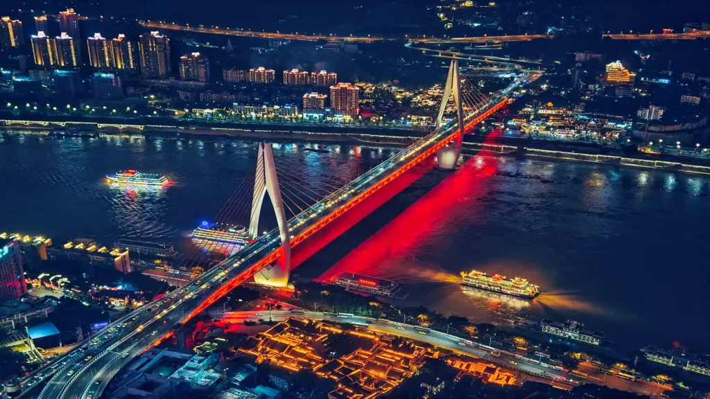 Private tour hero image of Chongqing night skyline with Hongyadong, rivers, bridges, and layered mountain city buildings